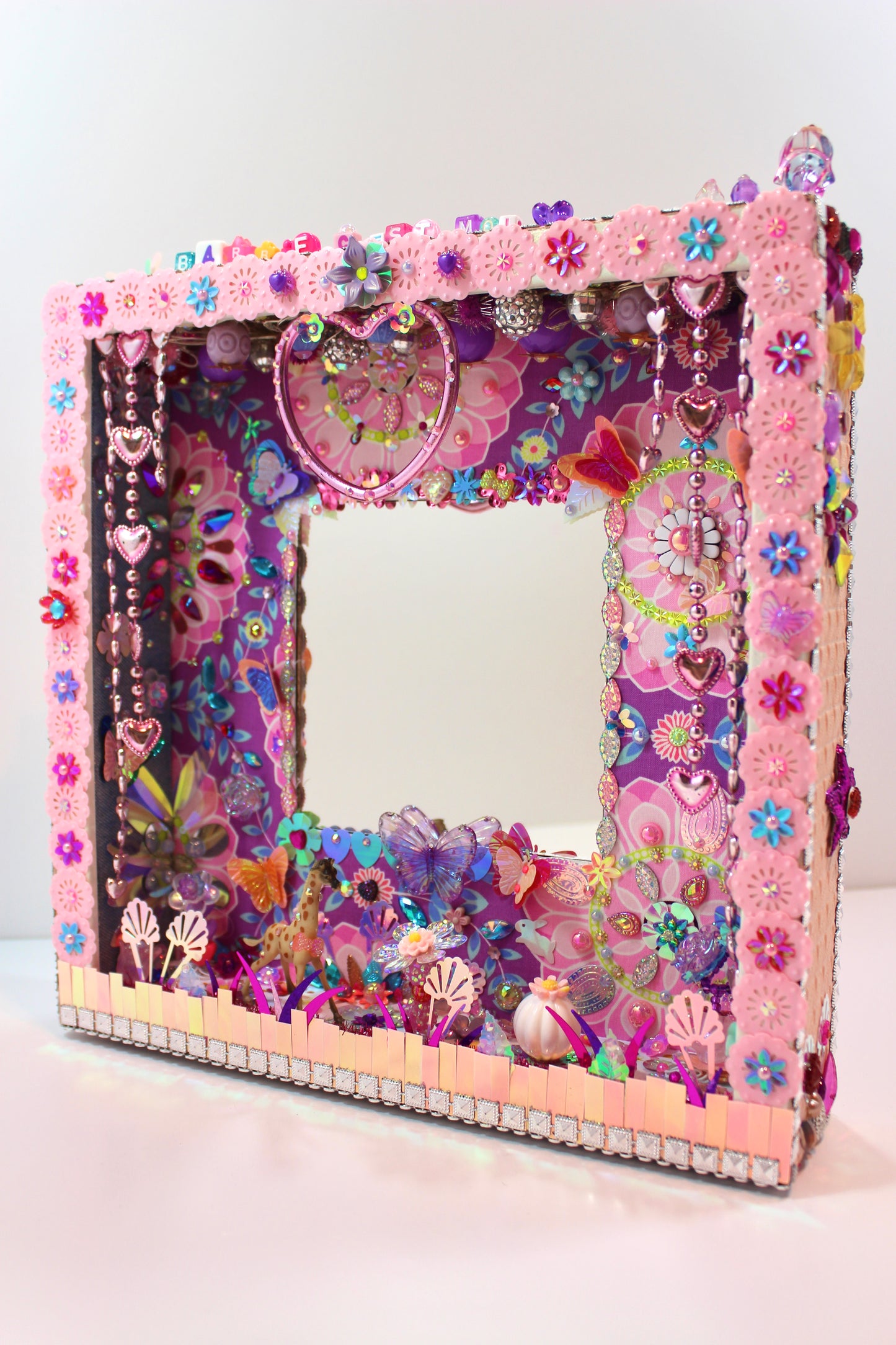 Miroir avec mini-paysage artistique et mantra inspirant