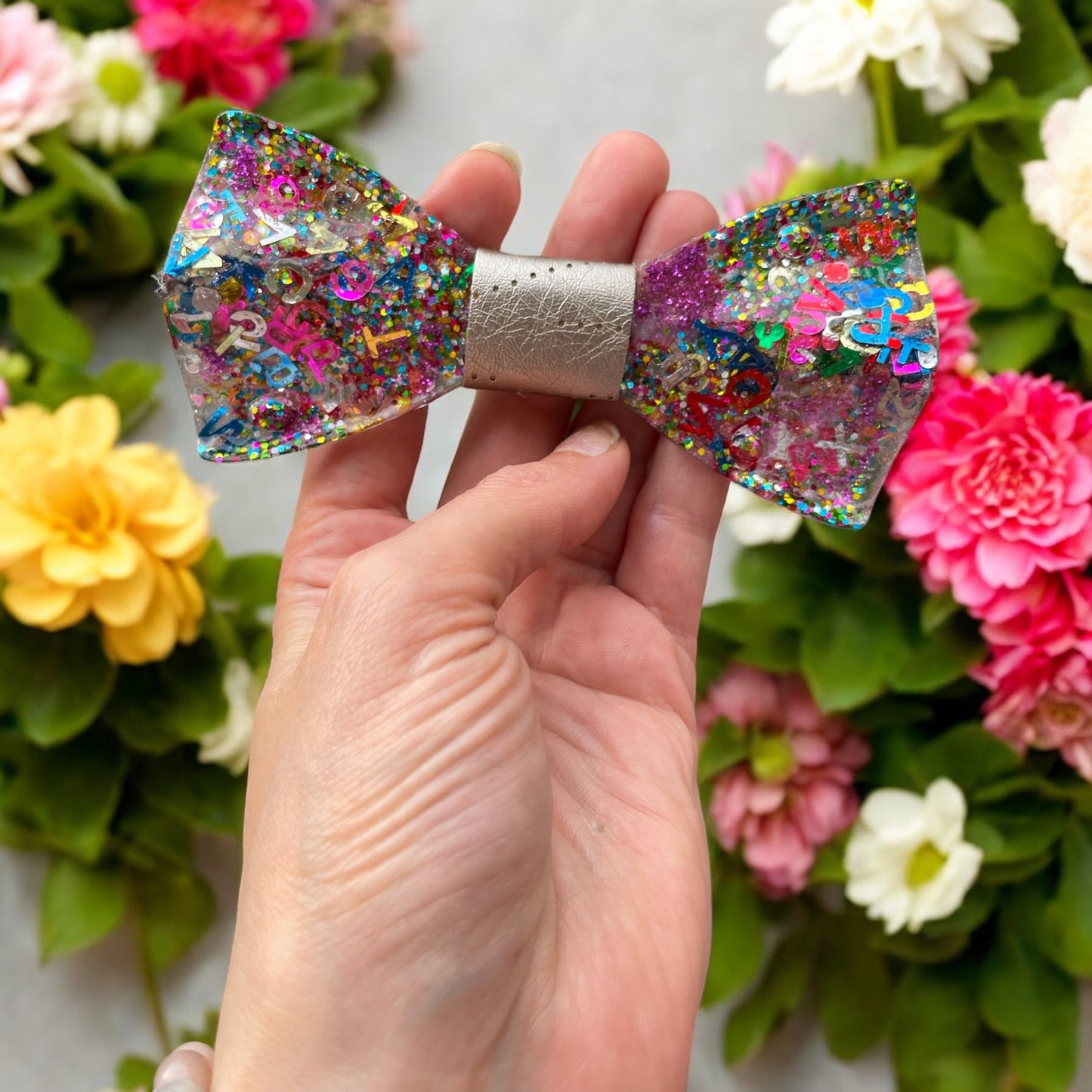 Resin Glitter Bow Tie - "My favorite letter is "M""