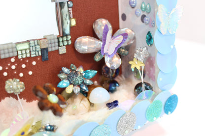 Gros plan sur le mini-paysage en sequins et rubans